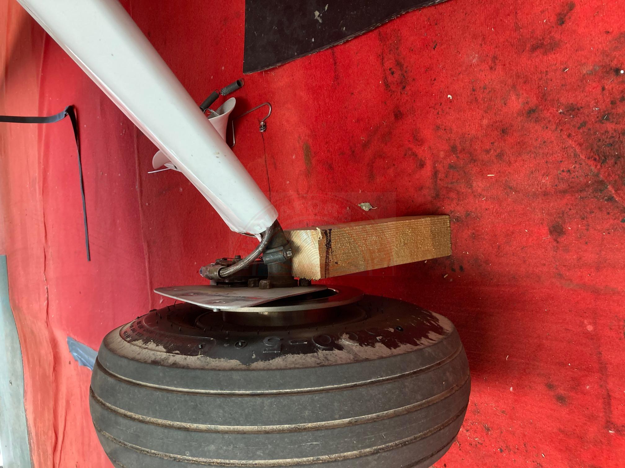 block of wood to chock up wheel 